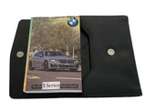 2023 BMW 5 Series Owner Manual Car Glovebox Book - product image of an owner manual book and protective black document pouch