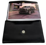2023 GMC Yukon XL Denali Owner Manual Car Glovebox Book - product image of an owner manual book and protective black document pouch
