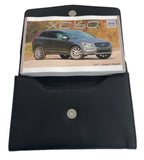 2017 Volvo XC60, Owner Manual Car Glovebox Book - product image of an owner manual book and protective black document pouch
