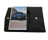 2022 BMW 5 Series Owner Manual Car Glovebox Book - product image of an owner manual book and protective black document pouch